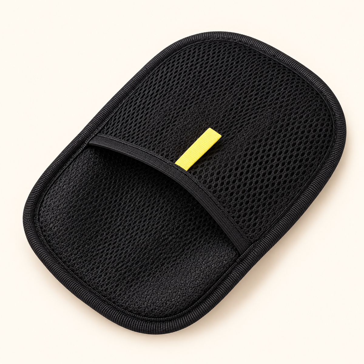Black mesh pet-hair mitt with hand pocket and yellow tab